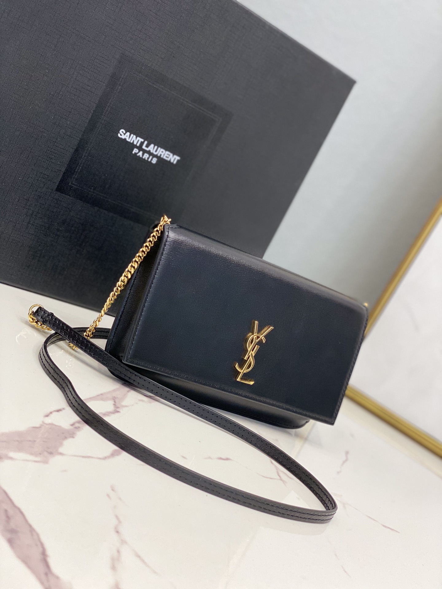 2020 cheap Saint Laurent monogram phone holder with strap in black smooth leather